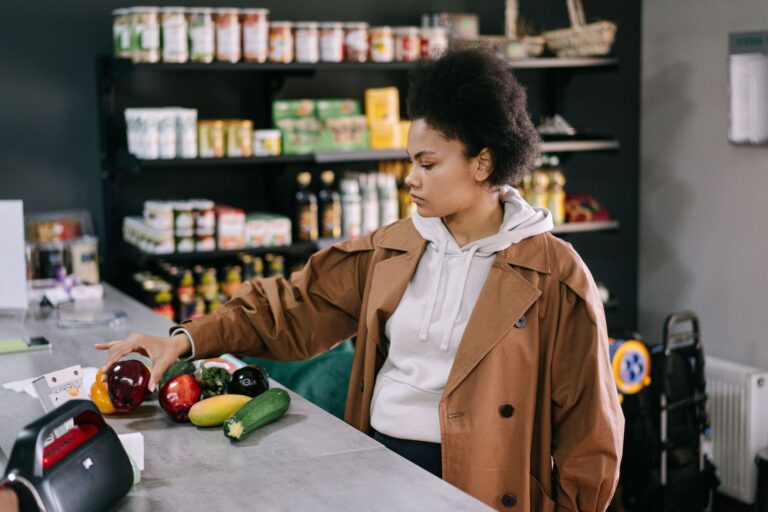 African American woman browsing products inside a grocery store